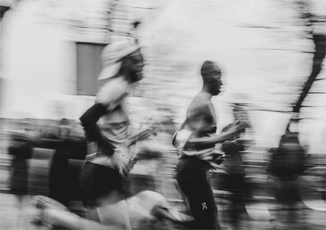 Runners moving through the city